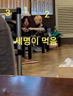 Jungkook, tattooer Rennis (Mijoo) and other person eating in a Seoul sundae (blood sausage) stew restaurant next to the tattooshop ta2luv