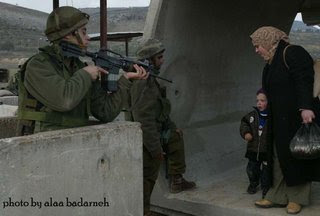 Israeli soldiers passing out candy to the kids