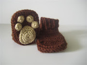 Paw Print Booties are a crochet slipper sock style baby bootie with a ribbed . (paw print booties )