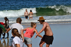 Playing frisbee on the beach