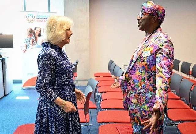 Queen Camilla wore an Aster printed midi dress by Samantha Sung. Camilla met with fitness star Derrick Evans