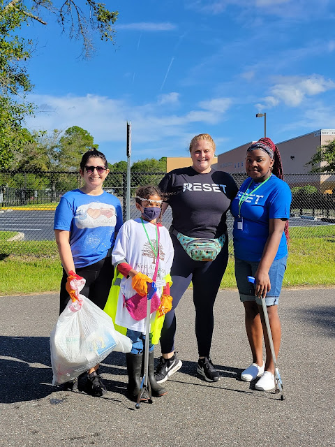 RESET St. Augustine's Alyssa Kelly and Lindsay Watters with West Augustine Nature Society co-founder Isabella Rodney and SAHS 10th grader Aniyah Bell