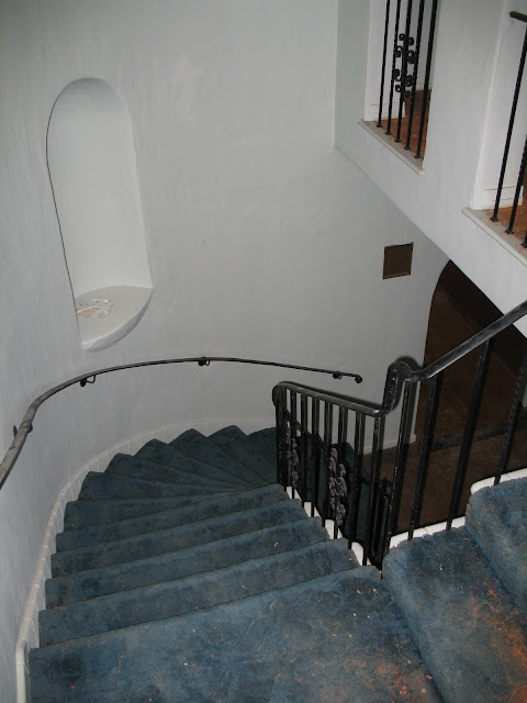 Staircase to upstairs landing in a Hancock park home prior to renovation
