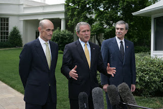 President George W. Bush, center, joined by Homeland Security Secretary Michael Chertoff, left, and Commerce Secretary Carlos Gutierrez, right, makes a statement on immigration reform Thursday, May 17, 2007 on the South Lawn of the White House. 'I want to thank the members of the Senate who worked hard', said President Bush. 'I appreciate the leadership shown on both sides of the aisle. As I reflect upon this important accomplishment, important first step toward a comprehensive immigration bill, it reminds me of how much the Americans appreciate the fact that we can work together -- when we work together they see positive things.' White House photo by Joyce Boghosian