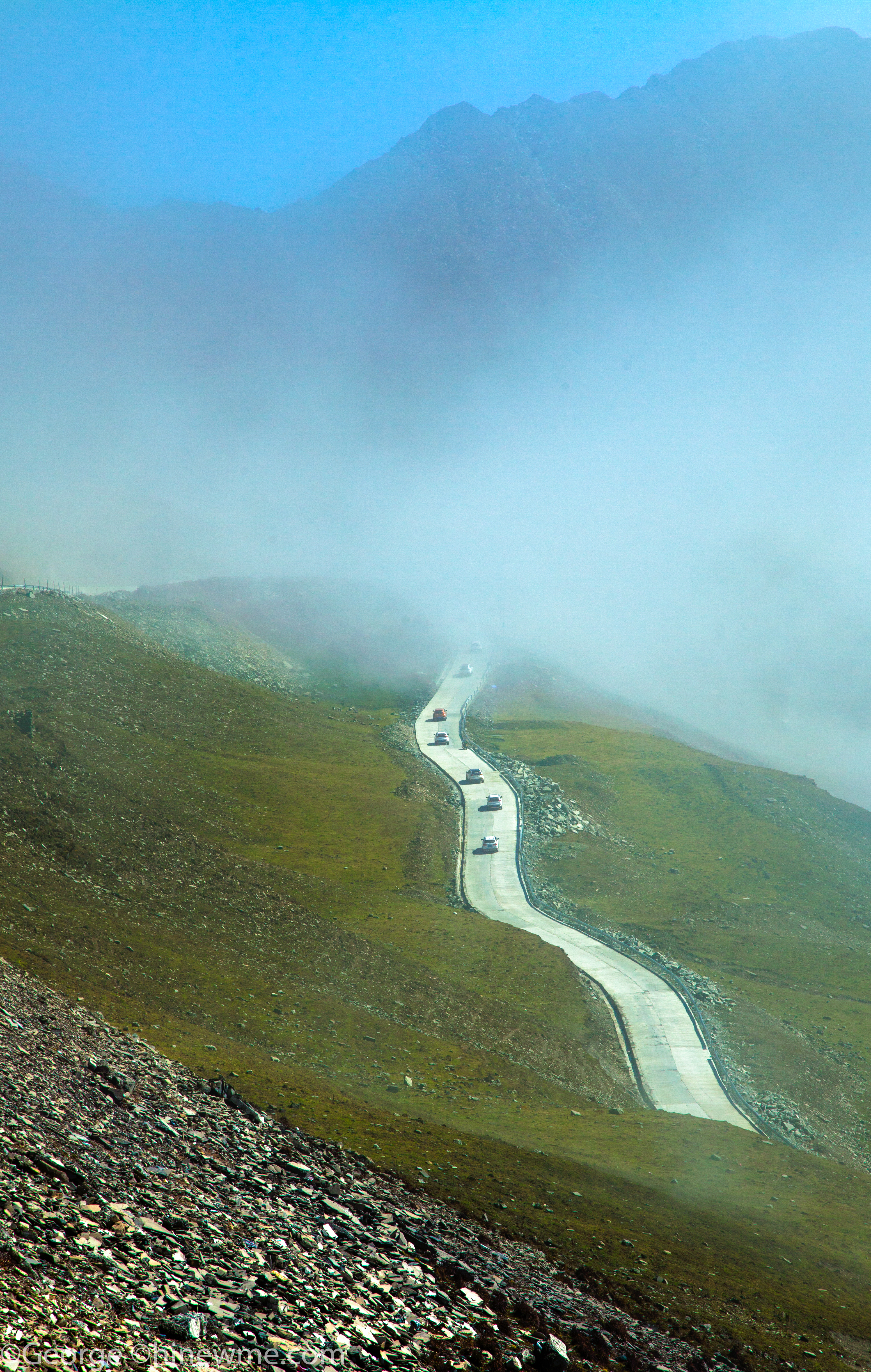 Driving an off-road vehicle to travel in the mountains photography -George