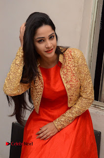 Telugu Actress Divya Nandini Stills in Orange Sleeveless Gown at Chennai Chaitrama Movie le Launch Event  0108.JPG