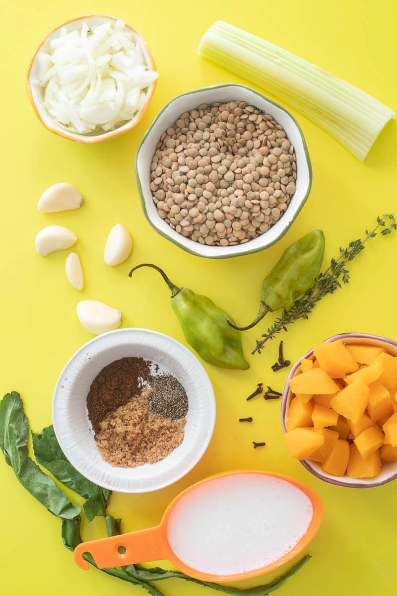 Ingredients needed to make stew lentils Trinidad, portioned out into amounts needed.