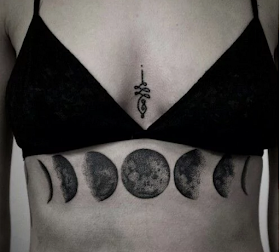 tatuaje fase lunar abdomen