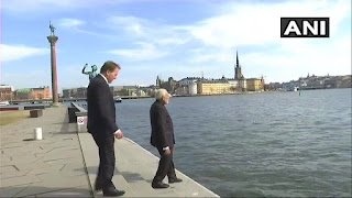 NARENDRA MODI WALKING TOWARDS WATER