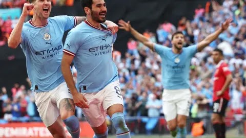 Manchester City beats Manchester United in the FA Cup to maintain its quest for a historic ‘treble’