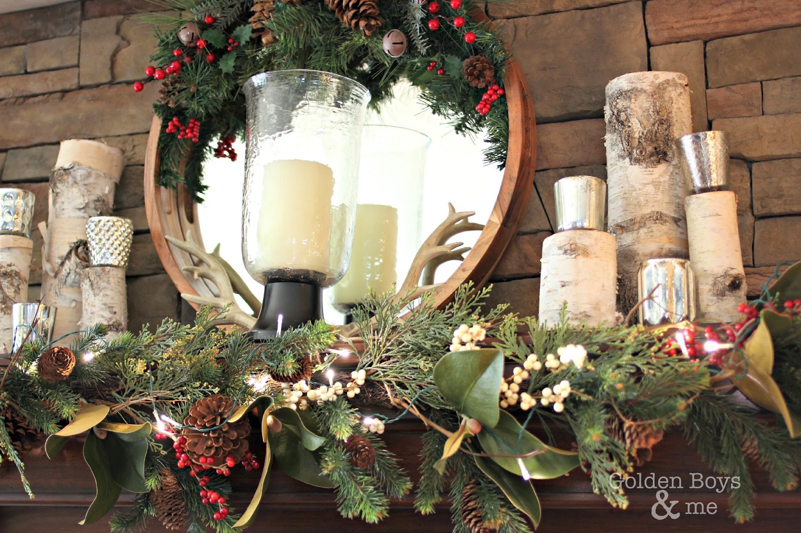 Pottery Barn magnolia and berry garland with mercury glass votives and mirror in Christmas family room-www.goldenboysandme.com
