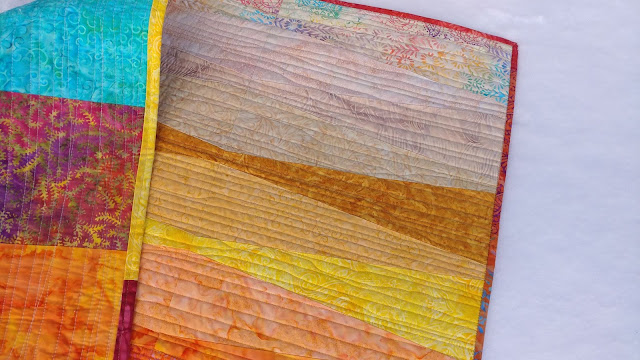 Sunset quilt made with Island Batik fabrics and Aurifil thread