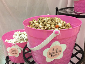 Everyone loves Popcorn, and throwing together a quick popcorn bar is the perfect dessert treat for any occasion. But when the girls are getting together, we need a little bit of fluff and a lot of food.  Check out this quick and easy Popcorn bar using items you probably already own!