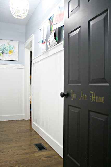 black doors with white beadboard