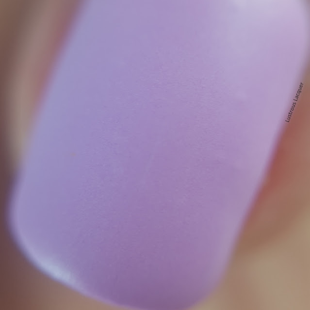 Muted-pastel-neon-purple-nail-polish-with-a-matte-finish