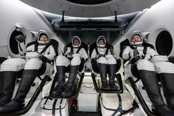The Crew-5 astronauts give a 'thumbs-up' sign after the hatch is opened on their Endurance capsule after she was safely placed aboard a SpaceX recovery vessel deployed to the Gulf of Mexico...on March 11, 2023.