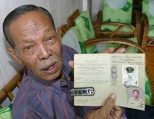 Zakaria with his keepsakes from his police days.