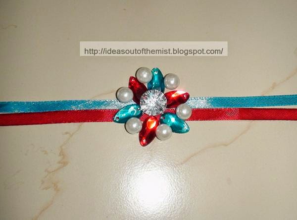 http://ideasoutofthemist.blogspot.in/2014/08/rakhi-making-ideas-for-young-kids-for.html