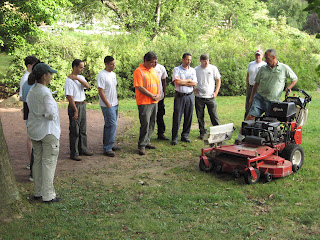 Tim Downey, owner of Aesthetic Landscape Care, consults with Greenburgh DPW 