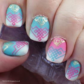 Pink, white, and aqua gradient nail art, stamped with tribal V-pattern.