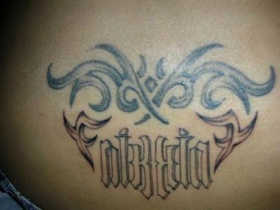 Forearm ambigram tattoo.