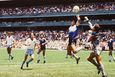 That's not the Hand of God of Maradona, it was kicked in the face!