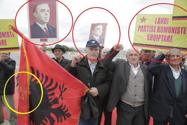 Albanian communists provoking while paying homage with the picture of former dictator Enver Hoxha