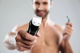 *"Beard trimmer settings guide - guard length, growth direction, steady technique"*