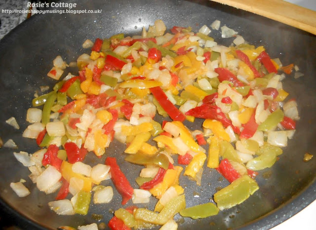 Easiest Ever, Super Yummy, Use What You Have Frittata: First the onions.and peppers are lightly cooked in olive oil...