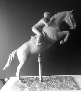 Bronze jumping horse sculpture by Kim Corpany in progress