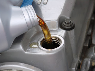 Step Changing Car Engine Oil