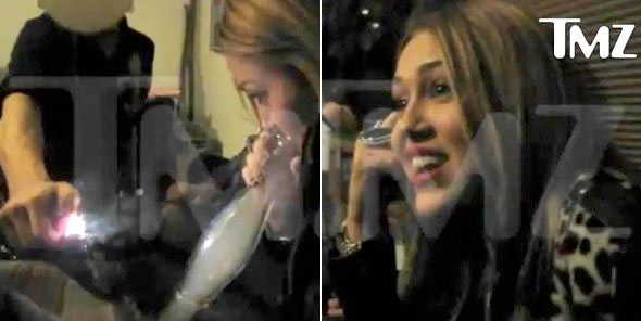 pics of miley cyrus smoking a bong. miley cyrus bong smoking.