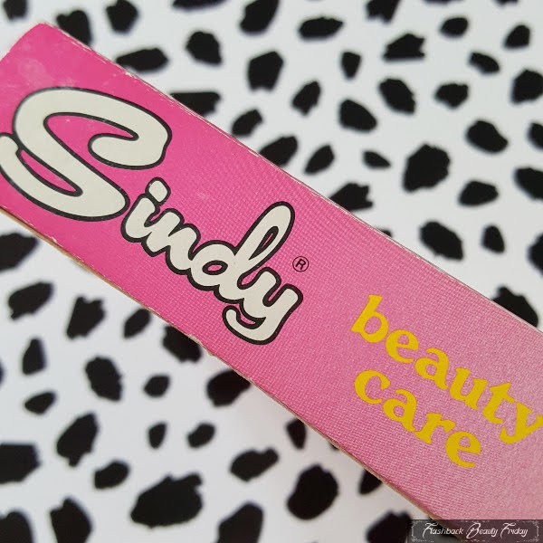 pink card box saying Sindy and beauty care in yellow