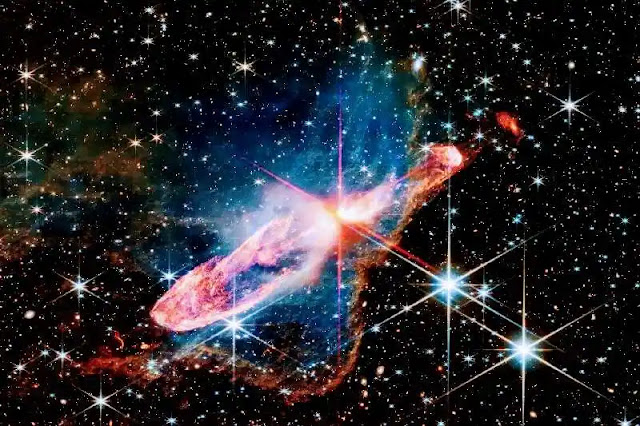 Potente telescopio James Webb captura imagen detallada de estrellas en formación Herbig-Haro 46/47 y revela fascinantes secretos sobre su proceso de nacimiento y la interacción con una misteriosa nube azul.