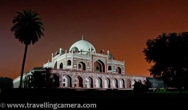 Recently some of my friends had permissions to visit various monuments in Delhi to shoot Lunar Eclipse on 10th Dec, 2011. I also joined them, although all the hard-work for planning these photo-shoots, getting permissions and arranging appropriate equipments was done by other folks. All photographs shared here are not related to the project. These are some of the casual shots taken during eclipse hours on that evening...Here is one of the simple shot when eclipse just started This shot was taken around 6:35 pm on 10th Dec, 2011 !!! Usually Lunar Eclipse used to take place in January, when sky is mainly covered with clouds or fog. Since this time, it happened early, people got to see it clearly and there was huge buzz among various Photography communities.Here is one of the photograph of Humayun's tomb. It's taken with Zoon-in/Zoom-out during long-exposure. Since most of folks were busy on eclipse project and they had to spent 4 hrs at Humayun's tomb, I thought of roaming around and having some clicks of the place in this wonderful lighting, which is rare to capture. Above photograph is also a result of some of the experiments done at Humayun's Tomb, Delhi.Here are some water ponds in all four directions of Humayn's Tomb, but the one in front of entry gate is maintained well. Reflection of the main tomb was looking awesome in Eclipse hours, although above photograph failed to show the real magic... You can see the shining moon in the sky and lovely hues of sunset, when exposed this view for a long time.A similar photograph of Humayn Tomb, with some part of it being reflecting on adjoining water stream... Usually Humayun Tomb closes before Sunset, but if someone wants to have access for some specific purpose, permissions are required in advance.Relatively closer look at Lunar Eclipse through Humayun Tomb. Lunar Eclipse of 10th Dec 2011 can be seen in Photographs at http://www.examiner.com/photography-in-national/yesterday-s-total-lunar-eclipse-photos-1 as well !!!Light and colors were changing with every minute. In fact the change was very prominent for folks who were shooting moon close-ups with tele-photo lenses. After one stage, color of moon starts changing to red and again come back natural shade after few hours...Opposite side of Humayun Tomb, Delhi, INDIAThere are various photography techniques are explained on web and some of them are really technical. At the same time, some of them are really easy to get an idea about the concept and light variation trend during the eclipse hours. In my opinion, understanding the concept and applying your ideas is more important otherwise we always see similar shots on every lunar eclipse. Now many softwares even come with standard ways of capturing lunar eclipse and create single HDR or multi-exposure shots.Carrying Gorilla-pod helps in placing camera at low height, so that some of the other compositions can be tried... No doubt that sturdy and big tripods are important for such shoots but some desi fundas also work well :)Humayun Tomb is very well maintained by Archaeological Survey of India !!! ASI is is the organization to get special permissions to get entry into Humayun Tomb in odd hours. There is lot of green area around main tomb in this campus. And there is very special thing about Mughal Architecture that all four areas around a building are maintained in similar fashion. Alignments of landscapes, gardens and trees would be exactly same.During day time, entry fees for SAARC citizens is 10 Rs. SAARC includes Bangladesh, Nepal, Bhutan, Sri Lanka, Pakistan, Maldives and Afghanistan... BIMSTEC Countries  like Bangladesh, Nepal, Bhutan, Sri Lanka, Thailand and Myanmar also need to pay 10 Rs only. For others it's $5.This photograph would be give you a sense about it's shape and architecture. It has a square base and all four faces of Humayun Tomb look same. Theoretically it's a two storey building but height of one storey is unmatchable :) ... Whole building is made of red stone and Taj Mahal is exactly replica of this building, but in white marble...Light streaks touching ground after filtering through tree leaves around Humayun Tomb... Such photographs from early morning look stunning, as light is most favorable at that point of time of the day...Check following link on wiipedia to know more about Humayun Tomb - http://en.wikipedia.org/wiki/Tomb_of_Humayun . This page has rich information about architecture of Humayun Tomb and history related to it.Humayun Tomb is also in the list of World Heritage sites maintained by UNESCO. Check out http://whc.unesco.org/en/list/232 for more details.Every other site about Delhi has special mention of Humayun Tomb, so I would not repeat all those well known facts about the place. Delhicapital.com has also written about Humayun Tomb in a well structured way... Check it out......A photographer sitting in front of main Tomb in the campus to shoot Lunar Eclipse 2011 with Humayun Tomb in foreground. These folks were sitting at same place, fiddling with camera setting to get best possible multi-exposure shots. Some of them also work on HDRs and hope to see the results soon.Some of the standard techniques of shooting Lunar Eclipses are available here - it was lovely evening with enthusiastic Photographers at Humayun Tomb !!!