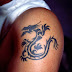Black Dangerous Dragon Tattoo On Men Shoulder