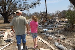 Adam Saunders takes his daughter, Olivia, to visit what used to be their home.