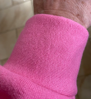 pink cuff of a sweatshirt