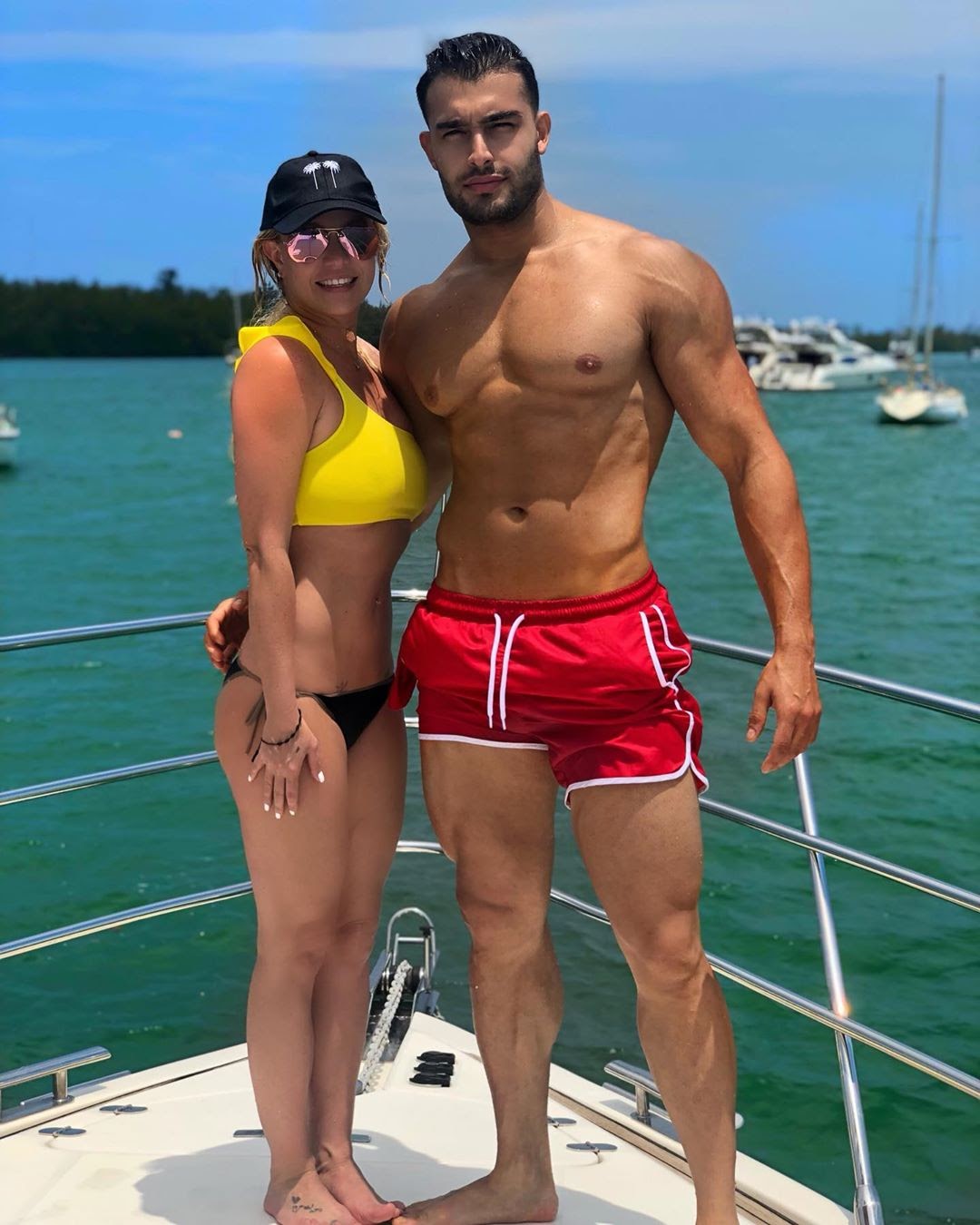 Britney Spears and Sam Asghari celebrating together.