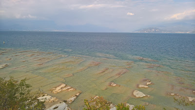 Limestone rocks around the tip of Sirmione.