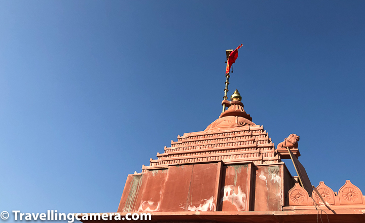 If you look up, the top of Dhaboi temple looks beautiful against blue sky and there are beautiful designs on the top with flag on the top of the structure.