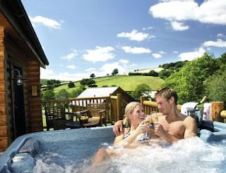 Relax in a Private Hot Tub with the Log Cabin