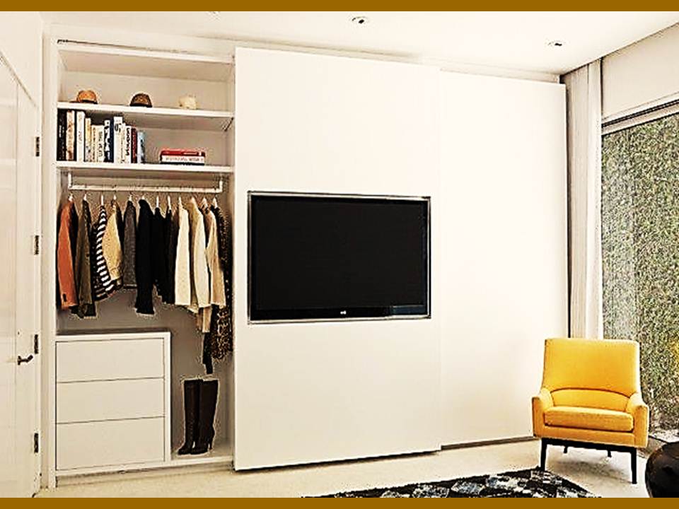 Дизайн шкафов телевизор. Шкаф с телевизором. Шкаф купе с телевизором. Телевизор встроенный в шкаф. Телевизор встроенный в шкаф в спальне.