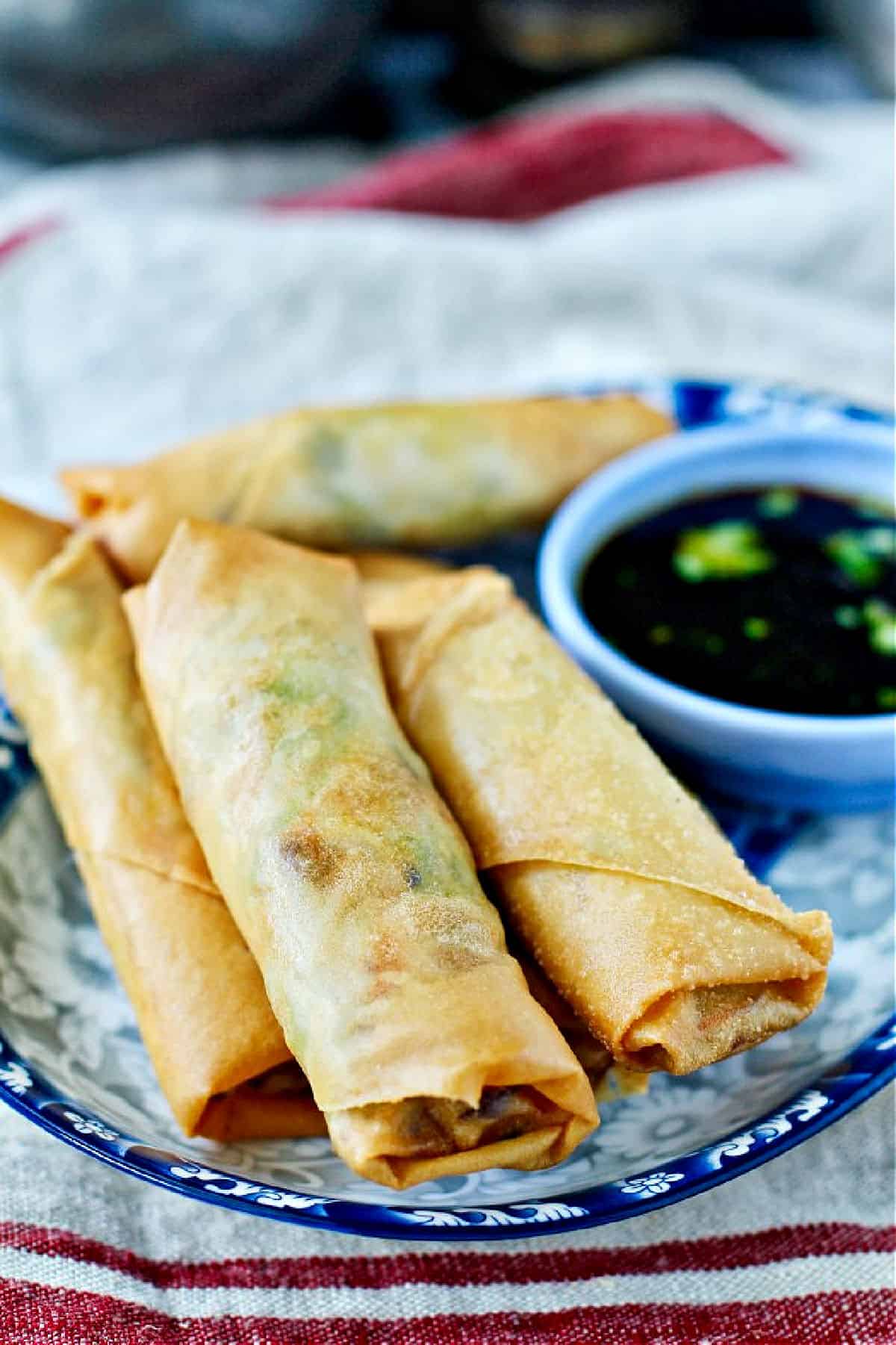 air-fried spring rolls on a serving plate.