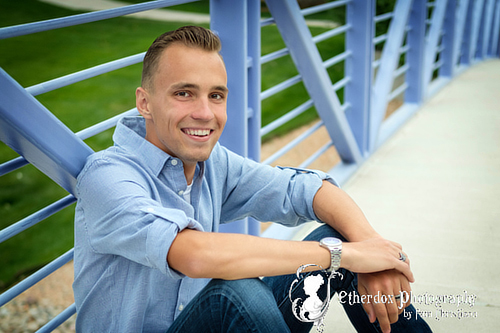 Professional portrait of a high school senior guy at a park Volcano Vista High School