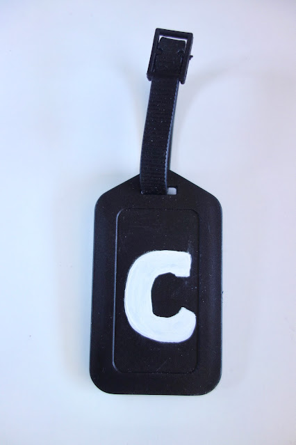 monogram, luggage tag with C logo, bag tag, travel accessories, blah to TADA, sticker, Sharpie paint pen, acrylic paint, paintbrush, handlettering, personalize a luggage tag