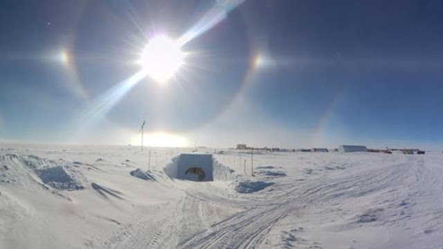 A visual depiction illustrating the phenomenon of ozone depletion and its repercussions on Antarctic biota, highlighting the importance of safeguarding the region's fragile ecosystems