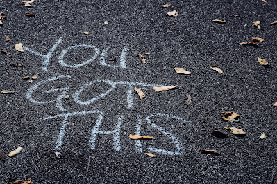 "You got this" drawn in chalk on a street (Credit: Sydney Rae/Unsplash)