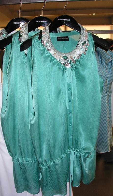 Pictured A silk seafoam top with jeweled collar necklace