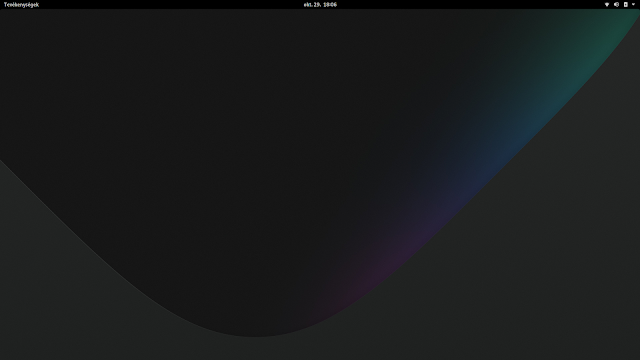 Manjaro Gnome asztal, fent panel, szürke háttérkép
